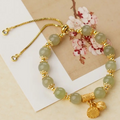 Lucky Lotus • Emerald Jade stone bracelet